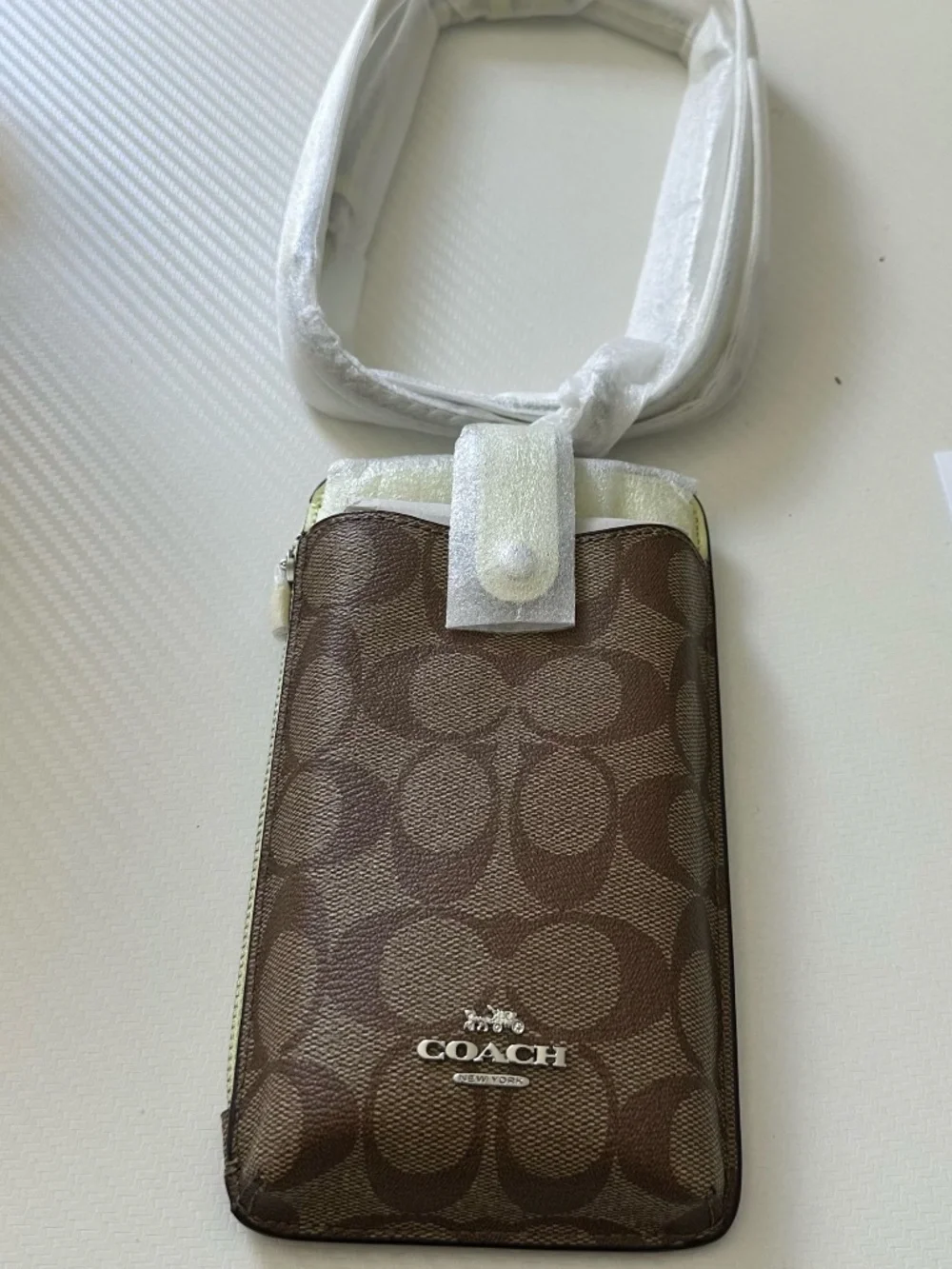 Coach  NORTH SOUTH PHONE CROSSBODY IN SIGNATURE CANVAS